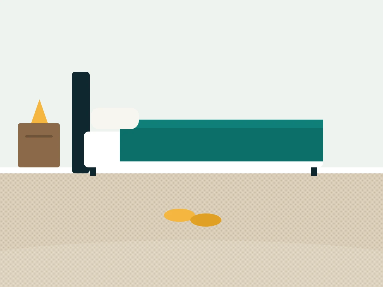 Carpeted bedroom with a made bed, bedside table and slippers on the carpet