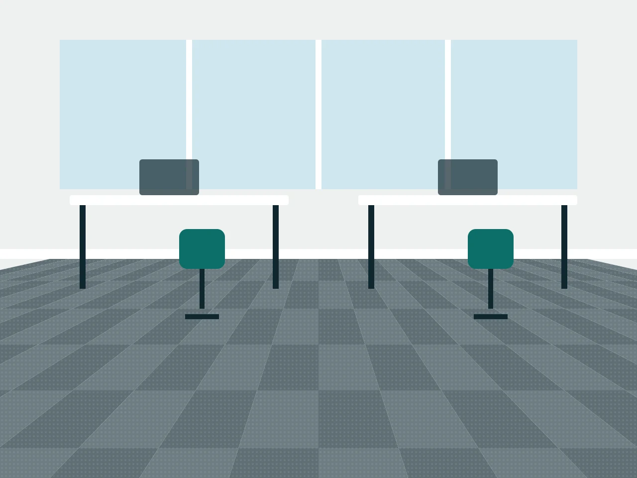 Office floor with grey carpet tiles, desks and chairs